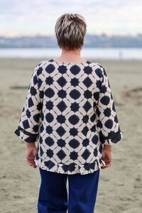 Oddly Polite Pleated Pony Top