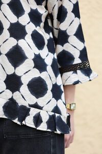 Oddly Polite Pleated Pony Top