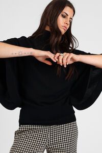 Storm Batwing Roll Neck Merino Sweater